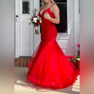 Clarisse red mermaid prom dress.